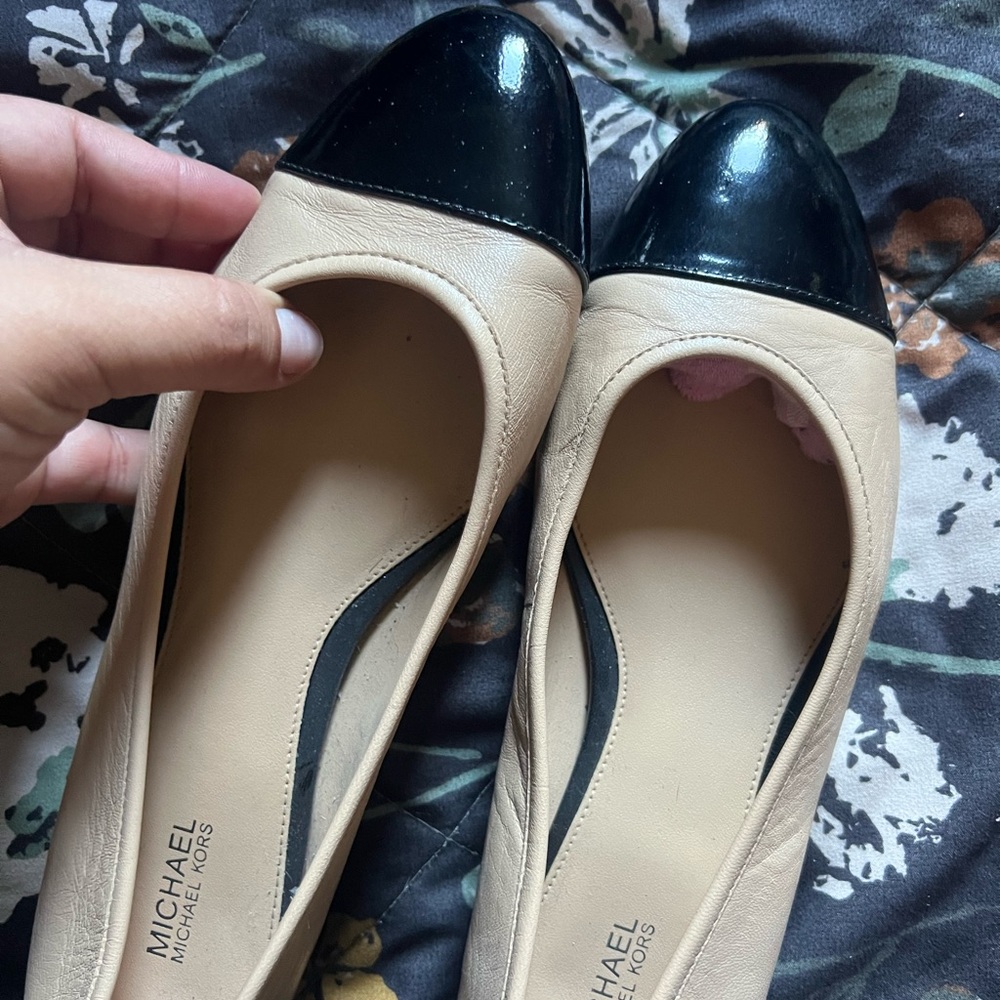 Michael Kors Black and Tan Cap-Toe Flats